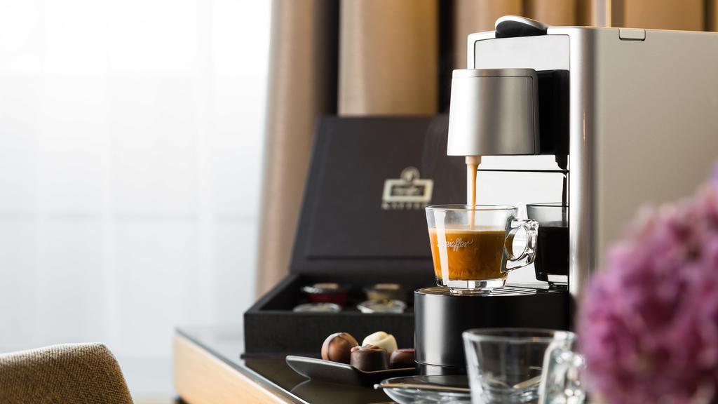 Althoff Hotel Am Schlossgarten Stuttgart Exterior photo A Caffè d'Italia coffee machine